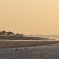 Vue de Cayeux-sur-mer depuis la plage au soleil couchant